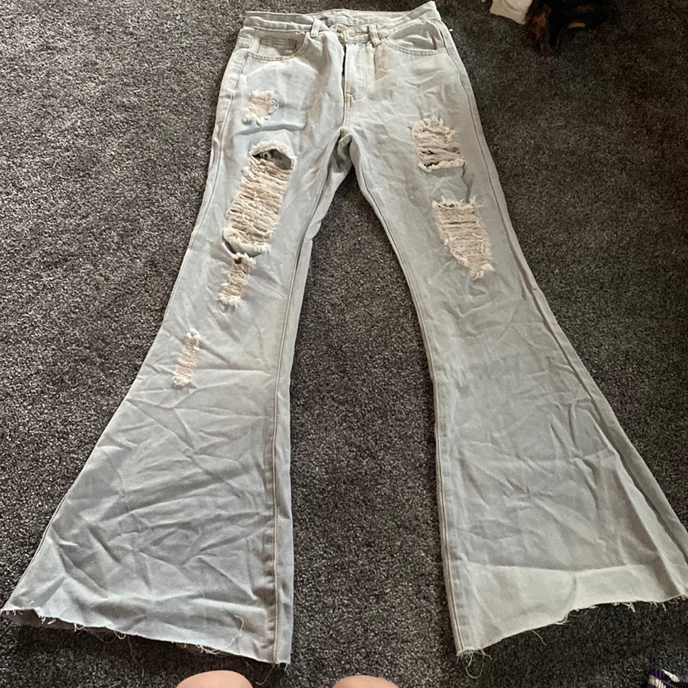 flared out ripped jeans
